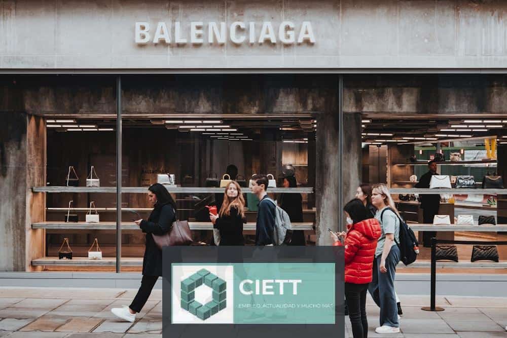 a group of people walking outside a store
